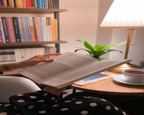Quiet evening routine with a book and soft lighting